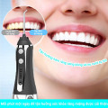 Máy tăm nước cầm tay cao cấp kèm 5 đầu tăm vệ sinh răng miệng